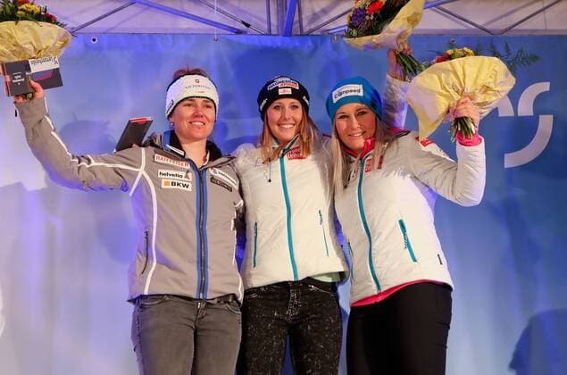 ALPINE SKIING - FIS WC Lenzerheide LENZERHEIDE,GERMANY,12.MAR.16 - ALPINE SKIING - FIS World Cup, Super G, ladies, award ceremony. Image shows the rejoicing of Fabienne Suter (SUI), Cornelia Huetter (AUT) and Tamara Tippler (AUT). Picture shot with a Canon EOS-1D X Mark II sample. GEPAxpictures xChristianxWalgram