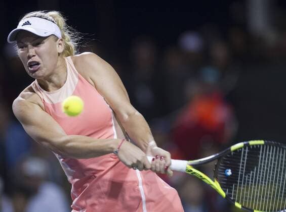 Caroline Wozniacki of Denmark returns the ball during the second round of women s singles match against Zhang Shuai of China on the BNP Paribas Open tennis at the Indian Wells Tennis Garden in Indian Wells, California, the United States on March 12, 2016. Wozniacki lost 1-2. ) (SP)US-INDIAN WELLS-TENNIS-BNP PARIBAS OPEN-WOMEN S SINGLES YangxLei 