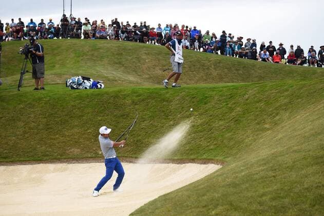 13.03.2016. Arrowtown, New Zealand. Japan s Hideto Tanihara plays out of the bunker on the 18th green during round 4 at The Hills during 2016 BMW ISPS Handa New Zealand Open. Sunday 13 March 2016. xAndrewxCornagax  ActionPlus11717584