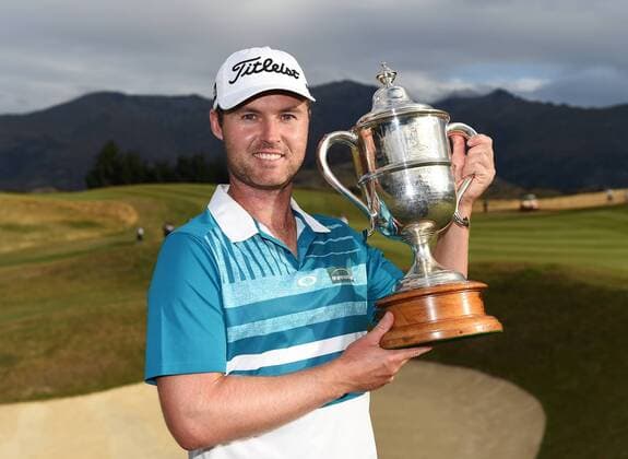 13.03.2016. Arrowtown, New Zealand. Australia s Matthew Griffin poses for a picture after winning the NZ Open at The Hills during 2016 BMW ISPS Handa New Zealand Open. Sunday 13 March 2016. xAndrewxCornagax  ActionPlus11717570