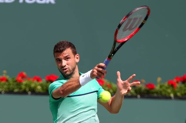 March 13, 2016: Grigor Dimitrov of Bulgaria returns a shot against Alexander Zverev of Germany during the 2016 BNP Paribas Open at Indian Wells Tennis Garden in Indian Wells, California. TENNIS 2016: BNP Paribas Open MAR 13 - ZUMAcb8_