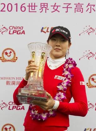South Korea s Lee Jung-min poses with her champion trophy after winning the World Ladies Championship at Mission Hills Golf Club in Shenzhen city, south China s Guangdong province, 13 March 2016. Lee Jung-min won the World Ladies Championship on Sunday (13 March 2016), beating fellow South Korean players Lee Seung-hyun, Kim Bo-kyung and Ji Han-sol in rainy conditions at Mission Hills. Lee Jung-min closed with a 6-under 66 for a 9-under 279 total on the Olazabal Course in the event sanctioned by the European, Korean and Chinese tours. Lee Jung-Min also won the team competition with Ko Jin-Young at 12 under. South Korea s Lee Jung-min wins World Ladies Championship  pbu414944_03