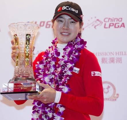 South Korea s Lee Jung-min poses with her champion trophy after winning the World Ladies Championship at Mission Hills Golf Club in Shenzhen city, south China s Guangdong province, 13 March 2016. Lee Jung-min won the World Ladies Championship on Sunday (13 March 2016), beating fellow South Korean players Lee Seung-hyun, Kim Bo-kyung and Ji Han-sol in rainy conditions at Mission Hills. Lee Jung-min closed with a 6-under 66 for a 9-under 279 total on the Olazabal Course in the event sanctioned by the European, Korean and Chinese tours. Lee Jung-Min also won the team competition with Ko Jin-Young at 12 under. South Korea s Lee Jung-min wins World Ladies Championship  pbu414944_04