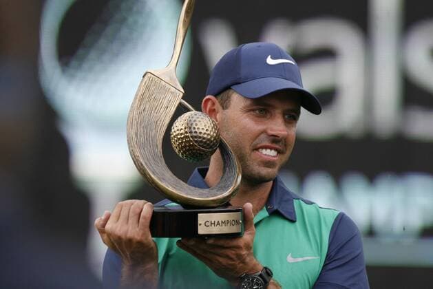 March 13, 2016 - Palm Harbor, Florida, U.S. - DOUGLAS R. CLIFFORD.2016 Valspar Championship winner Charl Schwartzel, from South Africa (RSA) , holds the championship trophy on Sunday (3 13 16).moments after defeating Billl Hass in an 18th hole playoff while completing in the PGA Golf Herren Tour s Valspar Championship on the Copperhead Course at the at the Innisbrook Resort in Palm Harbor. Florida News - March 13, 2016 - ZUMAs70_