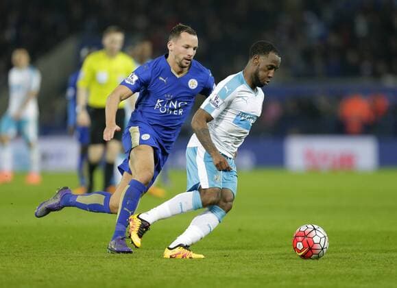 Vurnon Anita of Newcastle competes with Danny Drinkwater of Leicester City during the Barclays Premier League match at The King Power Stadium. Photo credit should read: Malcolm Couzens Sportimage EDITORIAL USE ONLY. No use with unauthorised audio, video, data, fixture lists, club league logos or live services. Online in-match use limited to 120 images, no video emulation. No use in betting, games or single club league player publications.