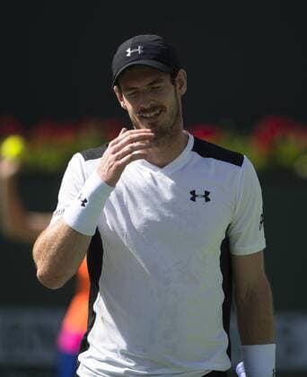 Andy Murray of Britain reacts during his third round men s singles against Federico Delbonis of Argentina at the BNP Paribas Open in Indian Wells, the United States, on March 14, 2016. Murray lost 1-2. Yang Lei) (SP)U.S.-INDIAN WELLS-TENNIS-BNP PARIBAS OPEN YangxLeixC 