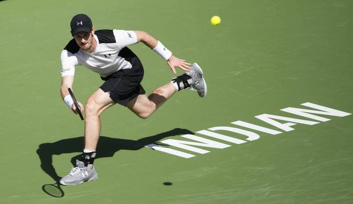 Andy Murray of Britain hits a return during his third round men s singles against Federico Delbonis of Argentina at the BNP Paribas Open in Indian Wells, the United States, on March 14, 2016. Murray lost 1-2. Yang Lei) (SP)U.S.-INDIAN WELLS-TENNIS-BNP PARIBAS OPEN YangxLeixC 