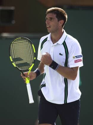 Federico Delbonis of Argentina reacts during his third round men s singles against Andy Murray of Britain at the BNP Paribas Open in Indian Wells, the United States, on March 14, 2016. Federico Delbonis won 2-1. Yang Lei) (SP)U.S.-INDIAN WELLS-TENNIS-BNP PARIBAS OPEN YangxLeixC 