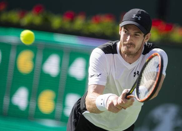 Andy Murray of Britain hits a return during his third round men s singles against Federico Delbonis of Argentina at the BNP Paribas Open in Indian Wells, the United States, on March 14, 2016. Murray lost 1-2. Yang Lei) (SP)U.S.-INDIAN WELLS-TENNIS-BNP PARIBAS OPEN YangxLeixC 