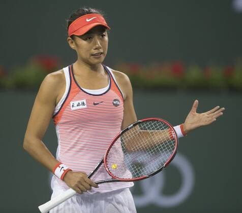 Zhang Shuai of China reacts during the women s singles 3rd round match against Victoria Azarenka of Belarus at the BNP Paribas Open in Indian Wells, California, the United States on March 14, 2016.Yang Lei) (SP)US-INDIAN WELLS-TENNIS-BNP PARIBAS OPEN YangxLeixc 