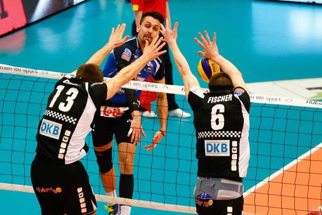 Berlin s Ruben Schott, Roeselare s Hendrik Tuerlinckx and Berlin s Felix Fischer fight for the ball during the first leg volleyball game between Belgian team Roeselare and German team Berlin during the semi finals of the CEV European Volleyball competition, Tuesday 15 March 2016, in Roeselare. KURTxDESPLENTER  x04812033x