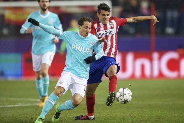 (L-R) Davy Propper of PSV, Andres Guardado of PSV, Augusto Fernandez of Club Atletico de Madrid during the UEFA Champions League Round of 16, Second leg match between Atletico madrid and PSV Eindhoven on March 15, 2016 at the Estadio Vicente Calder& 243;n in Madrid, Spain. Atletico Madrid v PSV Eindhoven UEFA Champions League 2015 2016 xVIxxIVx 5162918
