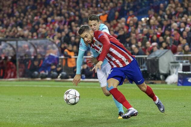 (L-R) Santiago Arias of PSV, Yannick Carrasco of Club Atletico de Madrid during the UEFA Champions League Round of 16, Second leg match between Atletico madrid and PSV Eindhoven on March 15, 2016 at the Estadio Vicente Calder& 243;n in Madrid, Spain. Atletico Madrid v PSV Eindhoven UEFA Champions League 2015 2016 xVIxxIVx 5163025