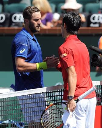 15 March 2016: Kei Nishikori (JPN) shakes hands with Steve Johnson (USA) after Nishikori defeated Johnson in back to back tie breakers 7-6(6), 7-6(5) during third round action of the BNP Paribas Open played at the Indian Wells Tennis Garden in Indian Wells, CA. (Photo By John Cordes Icon Sportswire) TENNIS: MAR 15 BNP Paribas Open Icon506160315031 EDITORIAL USE ONLY