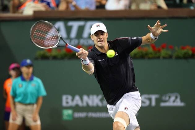 March 16, 2016: John Isner returns a shot against Kei Nishikori of Japan during the 2016 BNP Paribas Open at Indian Wells Tennis Garden in Indian Wells, California. TENNIS 2016: BNP Paribas Open MAR 16 - ZUMAcb8_