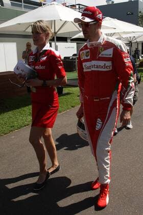 Australian Grand Prix, Melbourne 17 - 20 March 2016 17.03.2016 - Britta Roeske (AUT) Ferrari Press Officer and Sebastian Vettel (GER) Scuderia Ferrari SF16-H 
