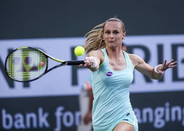INDIAN WELLS, March 17, 2016 -- Magdalena Rybarikova of Slovakia returns the ball against Victoria Azarenka of Belarus during the women singles quaterfinals of the BNP Paribas Open tennis tournament in Indian Wells, California, the United States, March 17, 2016. Azarenka won 2-0. ) (SP)US-INDIAN WELLS-TENNIS-BNP PARIBAS OPEN ZhaoxHanrong 