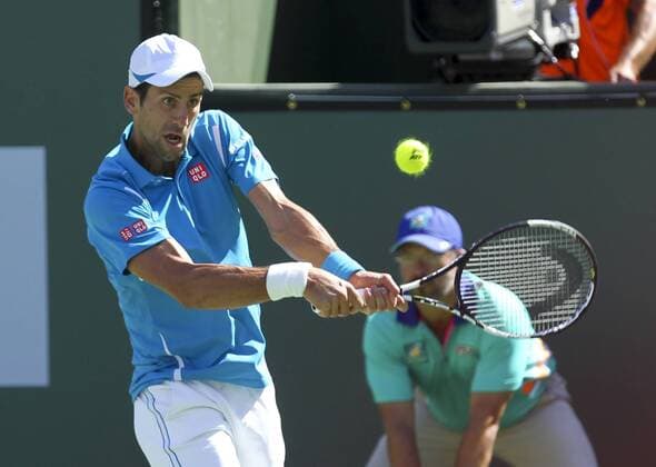 March 18, 2016 - Los Angeles, California, U.S - Novak Djokovic of of Serbia in actions defeating Jo-Wilfried Tsonga of of France during the men singles semifinal of the BNP Paribas Open tennis tournament on Friday, March 18, 2016 in Indian Wells, California. Tennis 2016 - BNP Paribas Open - Men Singles Semifinal - ZUMAc68_