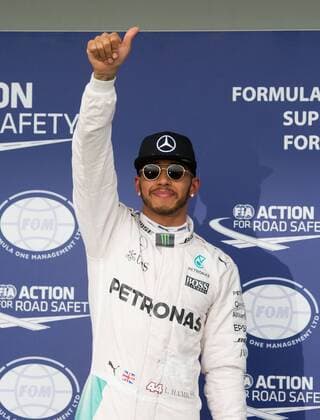 (160319) -- MELBOURNE, March 19, 2016 -- Mercedes AMG Petronas s Formula One driver Lewis Hamilton of Britain celebrates after winning the pole position at the qualifying session of Australian Formula One Grand Prix at Albert Park in Melbourne, Australia, March 19, 2016. The Australian Formula One Grand Prix will take place in Melbourne on March 20. ) (SP)AUSTRALIA-MELBOURNE-F1-QUALIFYING SESSION BaixXue 