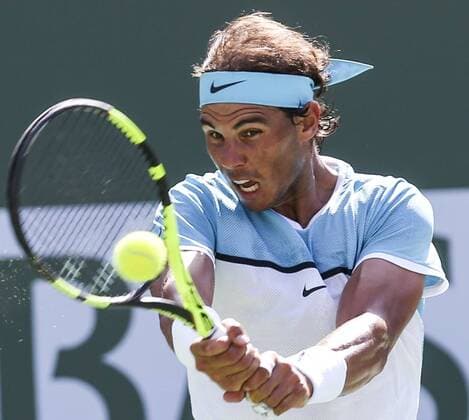 (160320) -- INDIAN WELLS, March 19, 2016 -- Rafael Nadal of Spain returns the ball during the men singles semifinal against Novak Djokovic of Serbia at the BNP Paribas Open tennis tournament in Indian Wells, California in the United States, on March 19, 2016. Djokovic won 2-0. ) (SP)U.S.-CALIFORNIA ATP Tennis Herren BNP PARIBAS OPEN ZhaoxHanrong 