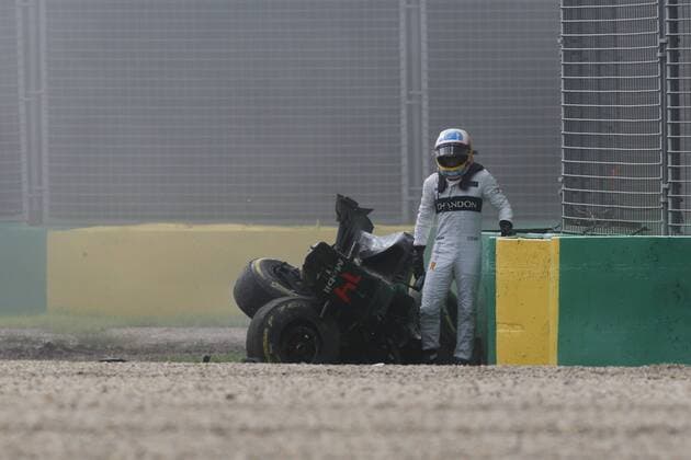March 20, 2016 - Melbourne, Australia - FERNANDO ALONSO of Spain and McLaren Honda is seen out of the car after a crash during the 2016 Formula 1 Australian Grand Prix at Albert Park Circuit, in Melbourne, Australia. F1 2016 - Australian Grand Prix - Rosberg Wins - ZUMAg147