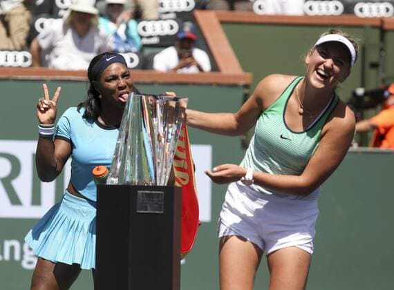 January 8, 2016 - Los Angeles, California, U.S - Victoria Azarenka, right, of Belarus celebrates with her trophy after defeating Serena Williams of United States during the women singles final match of the BNP Paribas Open tennis tournament on Sunday, March 20, 2016 in Indian Wells, California. Azarenka won 6-4, 6-4. BNP Paribas Open 2016 Women s Singles Final - ZUMAc68_