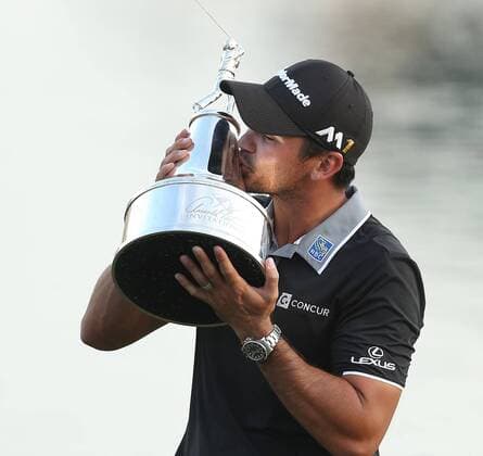 March 20, 2016 - Orlando, FL, USA - Jason Day kisses the trophy as he celebrates on the 18th green after winning the Arnold Palmer Invitational at Bay Hill Club & Lodge in Orlando, Fla., on Sunday, March 20, 2016. Jason Day goes wire to wire to win at Bay Hill - ZUMAm67_