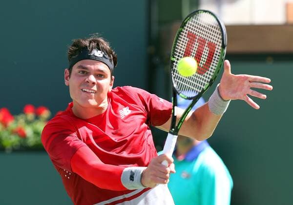 March 20, 2016: Milos Raonic of Canada returns a shot against Novak Djokovic of Serbia during the mens final of the 2016 BNP Paribas Open at Indian Wells Tennis Garden in Indian Wells, California. TENNIS 2016: BNP Paribas Open MAR 20 - ZUMAcb8_