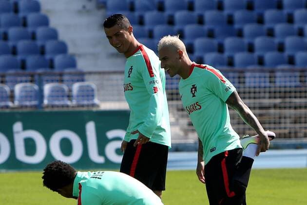 March 22, 2016 - Lisbon, Portugal - Portugal s soccer forward Cristiano Ronaldo (L ) rehearses the goal celebration choreography for Ricardo Quaresma (R ) during a practice session at the Restelo stadium in Lisbon, Portugal on March 22, 2016, ahead of the friendly matches against Bulgaria on March 25 and with Belgium on March 29 in preparation for the Euro 2016 in France. Portugal s soccer forward Cristiano Ronaldo rehearses the goal celebration choreography during practice  - ZUMAn230