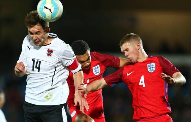 SOCCER - U18, AUT vs ENG, test match WIENER NEUSTADT,AUSTRIA,23.MAR.16 - SOCCER - OEFB Under-18 international match Länderspiel Austria vs England, friendly match. Image shows Maximilian Woeber (AUT) and Jacob Davenport (ENG). GEPAxpictures xCh.xKelemen