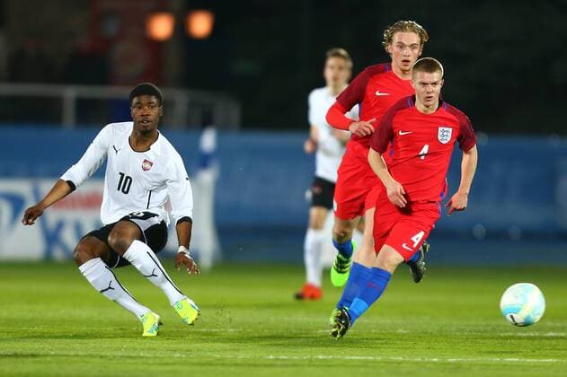 SOCCER - U18, AUT vs ENG, test match WIENER NEUSTADT,AUSTRIA,23.MAR.16 - SOCCER - OEFB Under-18 international match Länderspiel Austria vs England, friendly match. Image shows Kevin Danso (AUT) and Jacob Davenport (AUT). GEPAxpictures xCh.xKelemen