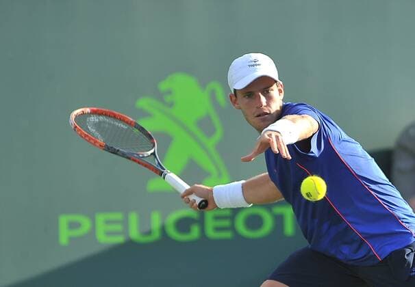 Argentinian tennis player Diego Schwartzman returns the ball to Canadian Vasek Pospisil during a Miami Tennis Open match held at Cayo Vizcaino, Miami, FL, United States, 23 March 2016. DIEGO SCHWARTZMAN VS. VASEK POPSIL !ACHTUNG: NUR REDAKTIONELLE NUTZUNG!  MIA015 20160324-635943794207549500