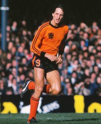 Football - 1978 World Cup Qualifier - Northern Ireland (Nordirland) 0 Holland 1 (12 10 1977) Johan Cruyff during the game in Belfast The Dutch team had agreed with adidas to wear their shirts with their famous three strips on the arms, but Cruyff had agreed a deal with Puma, and consequently Cruyff only wore two strips on his football shirt 