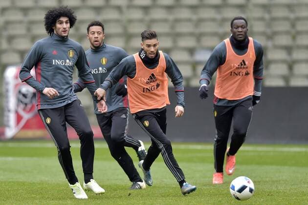 Belgium s Marouane Fellaini, Belgium s Moussa Dembele, Belgium s Yannick Ferreira Carrasco and Belgium s Romelu Lukaku pictured during a training session of the Belgian national soccer team Red Devils, Thursday 24 March 2016 in Brussels. The Red Devils will play a friendly game in and against Portugal on 29 March, the match was moved due to safety concerns after the Brussels terrorists attacks. The game is a preparation for the upcoming Euro2016. PETERxDExVOECHT  x04819988x
