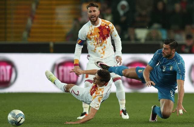 SOCCER - ITA vs ESP, test match UDINE,ITALY,24.MAR.16 - SOCCER - international match Nationalmannschaft-Länderspiel Italy vs Spain, friendly (Nationalmannschaft) match. Image shows Cesar Azpilicueta Tanco, Sergio Ramos Garcia (ESP) and Graziano Pelle (ITA). GEPAxpictures xAndreasxPranter