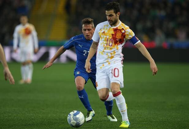 SOCCER - ITA vs ESP, test match UDINE,ITALY,24.MAR.16 - SOCCER - international match Nationalmannschaft-Länderspiel Italy vs Spain, friendly (Nationalmannschaft) match. Image shows Emanuela Giaccherini (ITA) and Francesc Fabregas Soler (ESP). GEPAxpictures xAndreasxPranter