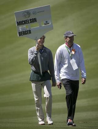 March 24, 2016 - Austin, TX, USA - Standard bearer Andrew Davis carries the scores for the second-round match between Daniel Berger and Phil Mickelson in the World Golf Championships Dell Match Play tournament at Austin Country Club in Austin, Texas, on Thursday, March 24, 2016. World Golf Championships Dell Match Play tournament - ZUMAm67_