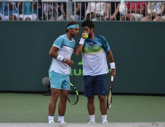 Spanish tennis players Rafael Nadal (L) and Fernando Verdasco (R) return the ball to Italy Simone Bolelli and Andreas Seppi during the first journey of the Masculine Miami Tennis Open in Cayo Vizcaino, Miami, FL, United States, 24 March 2016. RAFAEL NADAL AND FERNANDO VERDASCO VS SIMONE BOLELLI AND ANDREAS SEPPI !ACHTUNG: NUR REDAKTIONELLE NUTZUNG!  MIA032 20160325-635944671272622664