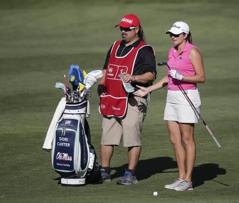 March 25, 2016: Dori Carter hands a head cover to her caddie on the 18th fairway during the second round of the Kia Classic at Aviara Golf Club in Carlsbad, California. LPGA Golf Damen 2016: Kia Classic MAR 25 - ZUMAc04_