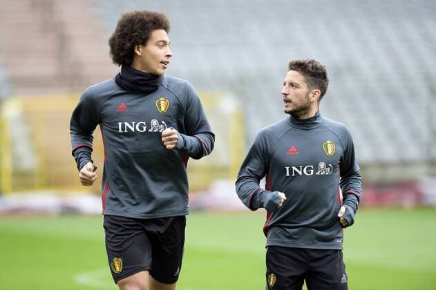Belgium s Axel Witsel and Belgium s Dries Mertens pictured during a training session of the Belgian national soccer team Red Devils, Sunday 27 March 2016 in Brussels. The Red Devils will play a friendly game in and against Portugal on 29 March, the match was moved due to safety concerns after the Brussels terrorists attacks. The game is a preparation for the upcoming Euro2016. NICOxVEREECKEN  x04821788x