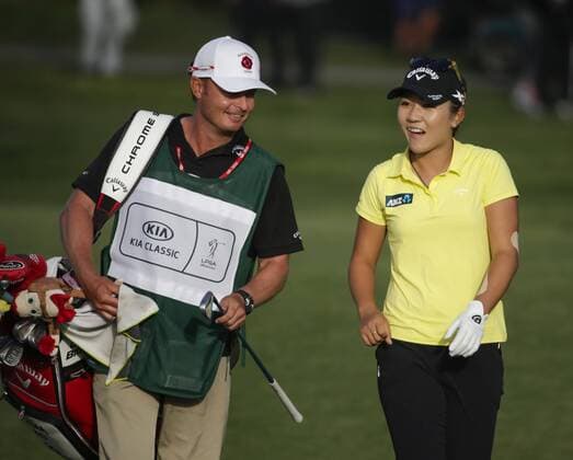 March 27, 2016: Lydia Ko hands off her iron on the 18th fairway after taking her second shot of the hole during the final round of the Kia Classic at Aviara Golf Club in Carlsbad, California. Lydia Ko wins by 19 under for the tournament. LPGA Golf Damen 2016: Kia Classic MAR 27 - ZUMAc04_