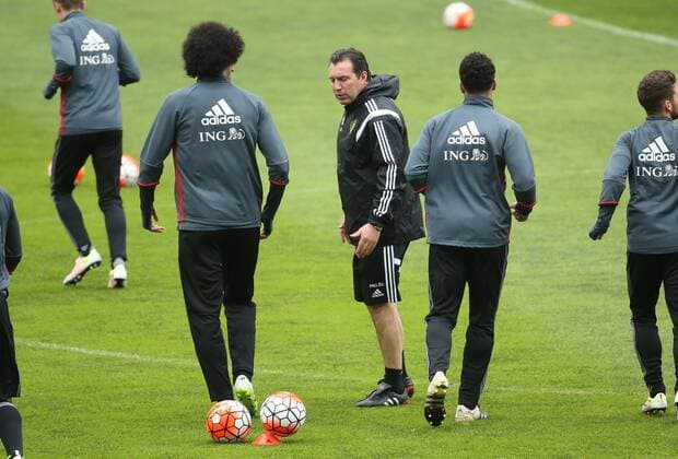Belgium s head coach Marc Wilmots (C) talks to his players during a training session of the Belgian national soccer team Red Devils in Leiria, Portugal, Monday 28 March 2016. The Red Devils will play a friendly game in and against Portugal on 29 March, the match was moved due to safety concerns after the Brussels terrorists attacks. The game is a preparation for the upcoming Euro2016. VIRGINIExLEFOUR  x04822475x