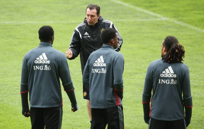 Belgium s head coach Marc Wilmots (C) talks to his players during a training session of the Belgian national soccer team Red Devils in Leiria, Portugal, Monday 28 March 2016. The Red Devils will play a friendly game in and against Portugal on 29 March, the match was moved due to safety concerns after the Brussels terrorists attacks. The game is a preparation for the upcoming Euro2016. VIRGINIExLEFOUR  x04822477x