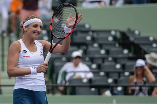 March 28, 2016 - Miami, Florida, United States - TIMEA BACSINSZKY of Switzerland waves to the crowd after winning her match vs. A. Radwanska at the Miami Open Tennis 2016 - Miami Open - Day 8 - ZUMAl132