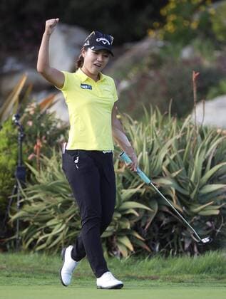 March 27, 2016 - Carlsbad, USA - CARLSBAD, March 27, 2016 Lydia Ko celebrates after making a birdie putt at the 18th hole to win the Kia Classic at the Aviara Golf Club in Carlsbad on Sunday. -Mandatory Photo Credit: Photo by Hayne Palmour IV San Diego Union-Tribune, LLC Lydia Ko celebrates after making a birdie putt at the 18th hole to win the Kia Classic. - ZUMAs44_