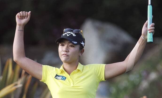March 27, 2016 - Carlsbad, USA - CARLSBAD, March 27, 2016 Lydia Ko celebrates after making a birdie putt at the 18th hole to win the Kia Classic at the Aviara Golf Club in Carlsbad on Sunday. -Mandatory Photo Credit: Photo by Hayne Palmour IV San Diego Union-Tribune, LLC San Diego California News - March 27, 2016 - ZUMAs44_