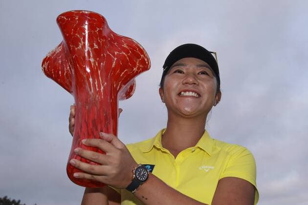 March 27, 2016 - Carlsbad, USA - CARLSBAD, March 27, 2016 Lydia Ko holds up the trophy after winning the Kia Classic at the Aviara Golf Club in Carlsbad on Sunday. -Mandatory Photo Credit: Photo by Hayne Palmour IV San Diego Union-Tribune, LLC Lydia Ko holds up the trophy after winning the Kia Classic. - ZUMAs44_