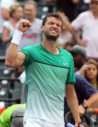 March 28, 2016 - Key Biscayne, FL, USA - Grigor Dimitrov of Bulgaria reacts after winning a men s fourth-round match against Andy Murray of Great Britain at the Miami Open on Monday, March 28, 2016, in Key Biscayne, Fla. Miami Open - ZUMAm67_