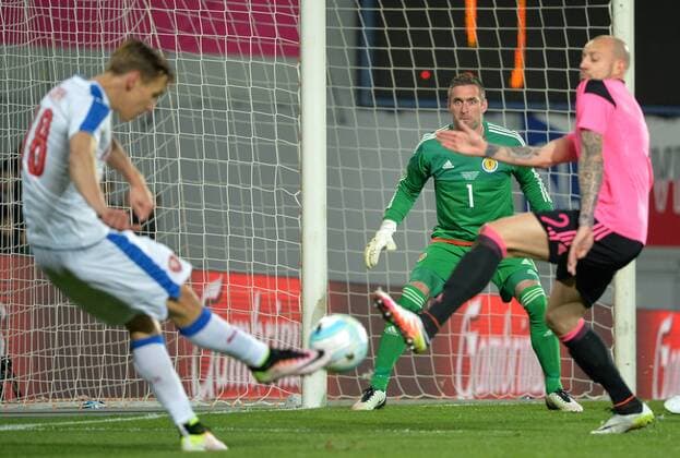 Josef Sural of Czech Republic, from left, and goalkeeper Allan McGregor and Alan Hutton of Scotland in action during the friendly soccer match Czech Republic vs Scotland in Prague, Czech Republic, Thursday, March 24, 2016. (CTKxPhoto MichalxDolezal) CTKPhotoP201603241041301  dol 0009