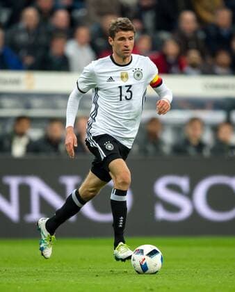 Fußball, Länderspiel, Deutschland - Italien 29. Maerz 2016: Muenchen, Allianz Arena: Fussball Testspiel: Deutschland - Italien: Thomas Mueller (Deutschland)l.